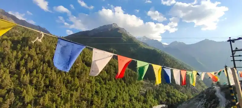 Bikers group photo under blue sky Spiti