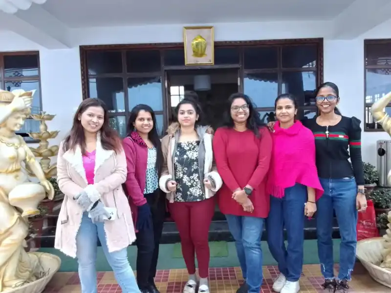 Tour Group posing at temple Sikkim